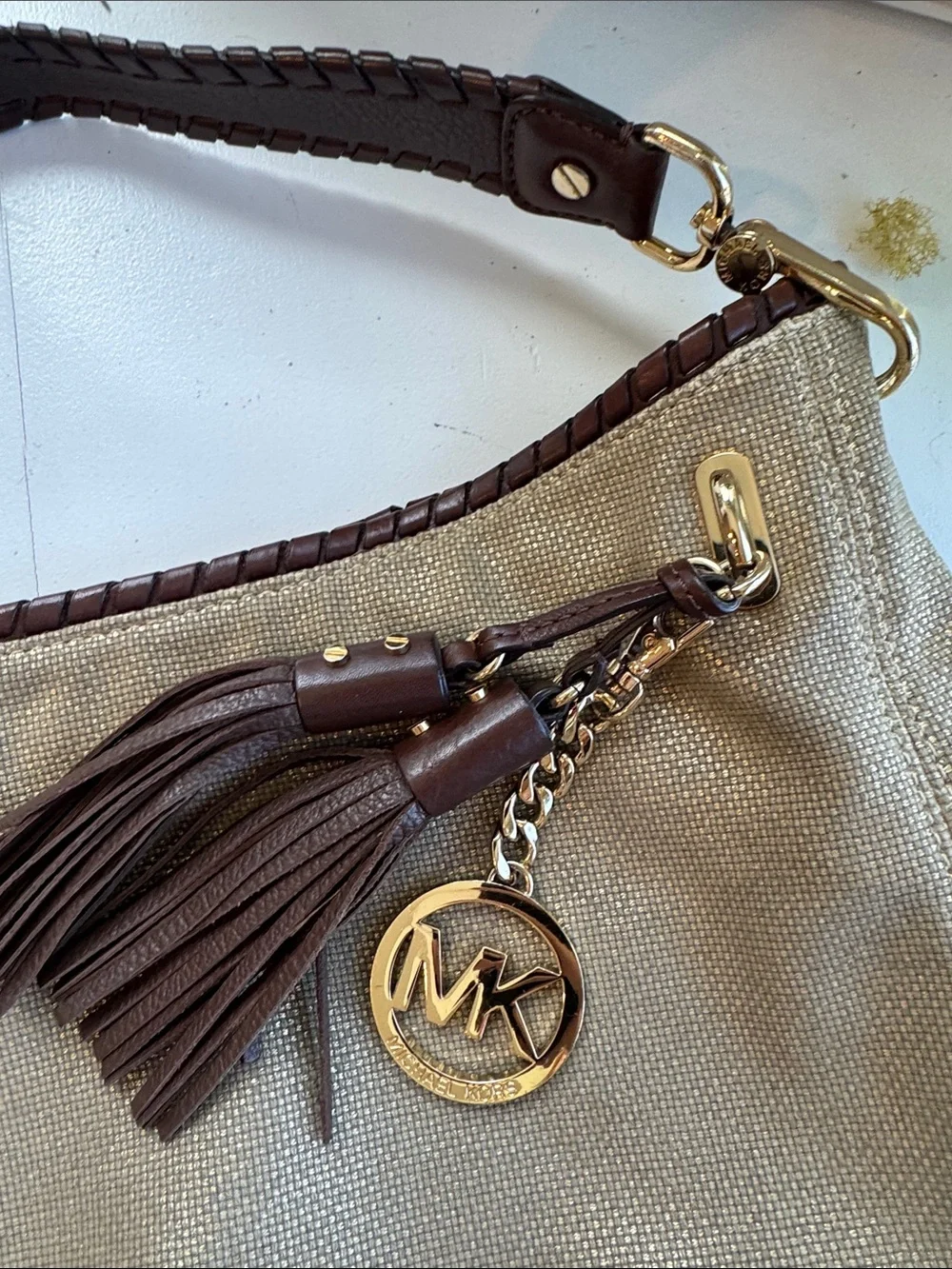 Michael Kors Metallic Gold Shoulder Hobo Bag with Brown Tassel Accent